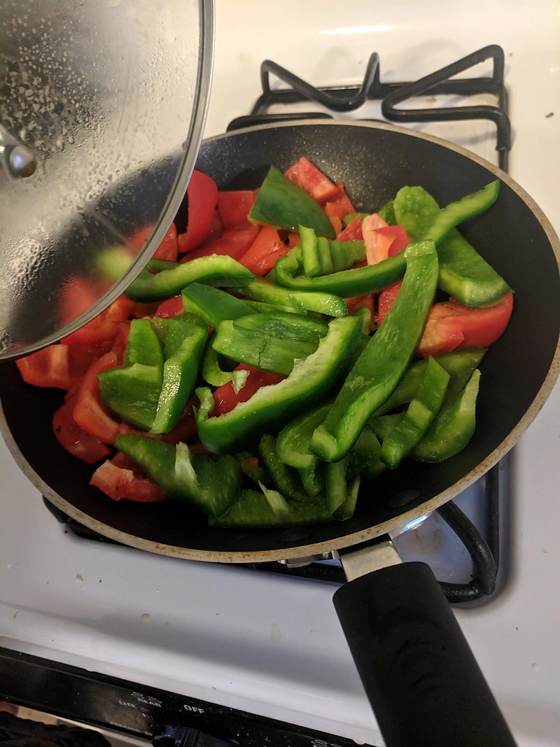 Peppers frying in a pan